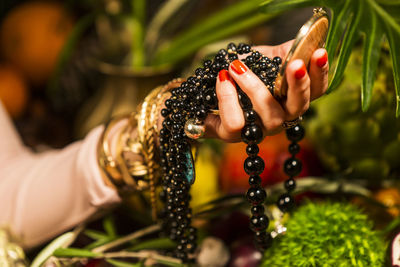 Close-up of hand holding berries