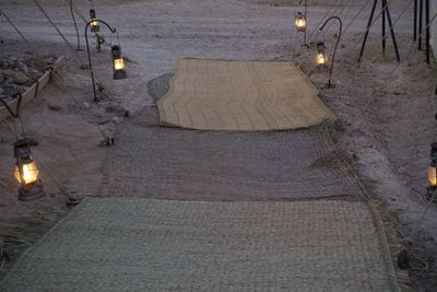 High angle view of illuminated lamp on table