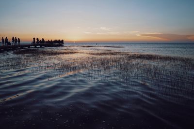 Scenic view of beach during sunset