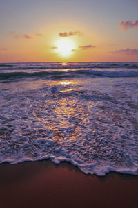 Scenic view of sea against sky during sunset