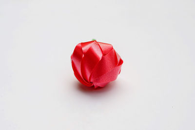 Close-up of rose against white background