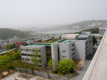 High angle view of buildings against clear sky