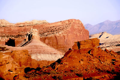 Scenic view of rocky mountains against clear sky