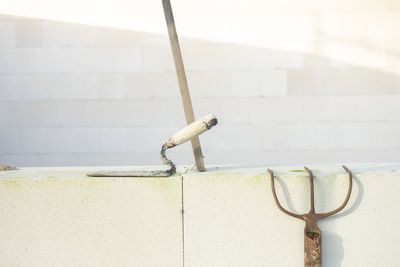 Close-up of chain on wall