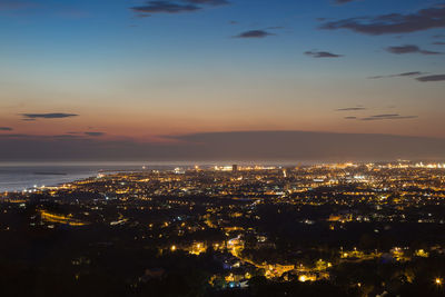 Aerial view of the city of livorno in tuscany at dusk.