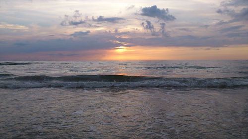 Scenic view of sea at sunset