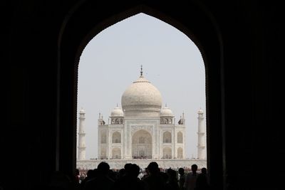 Group of people in front of historical building