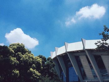 Low angle view of building against blue sky