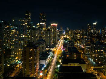 Illuminated cityscape at night