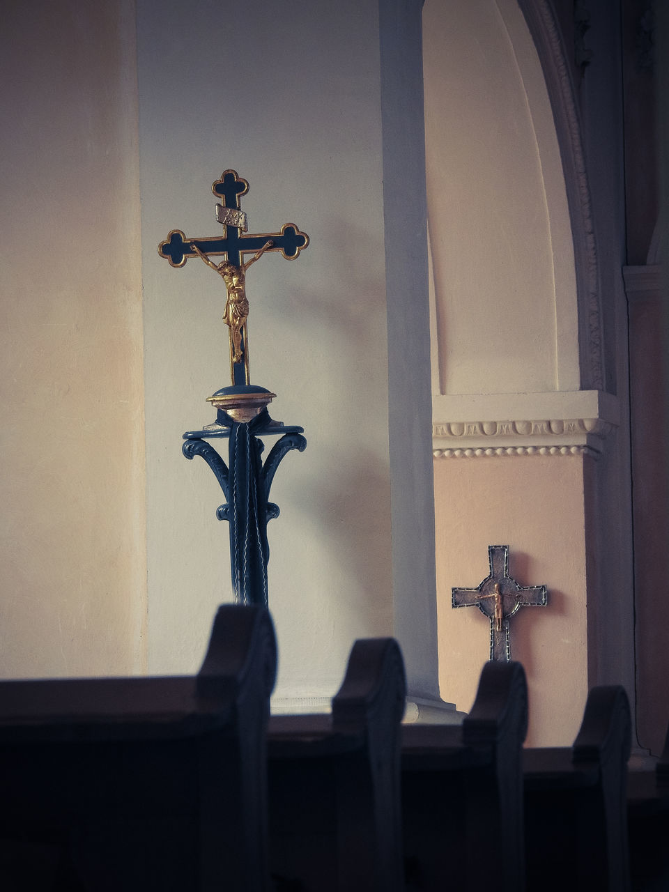 CROSS ON WALL BY BUILDING