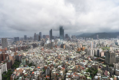 View of taipei 101 an iconic landmark in taipei, taiwan. taken during a rainy day