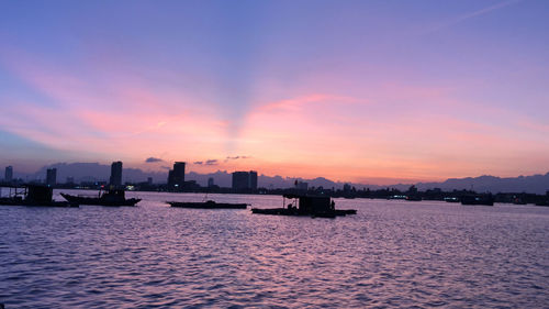 Scenic view of sea against sky at sunset