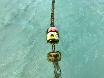 High angle view of buoy in sea