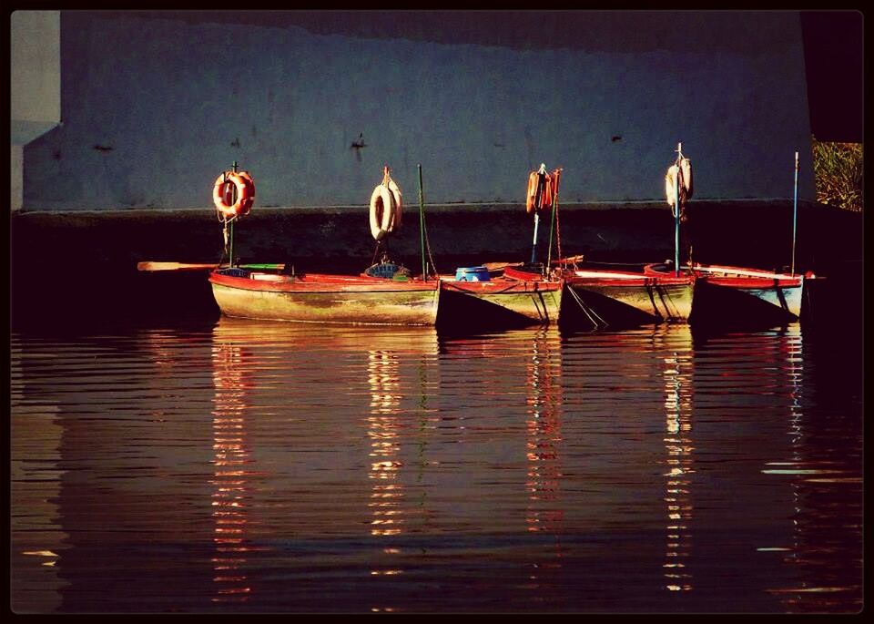 transfer print, reflection, water, auto post production filter, indoors, wood - material, waterfront, table, still life, no people, nautical vessel, close-up, day, side by side, group of objects, boat, moored, hanging, wooden