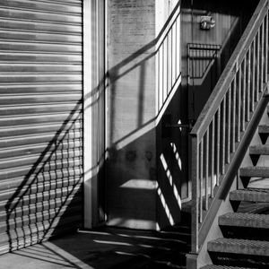 Low angle view of stairs with shadows