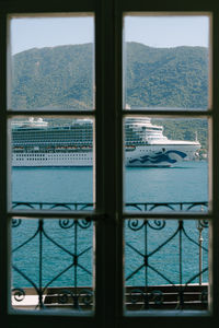 View of sea through window