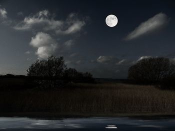 Scenic view of moon against sky at night