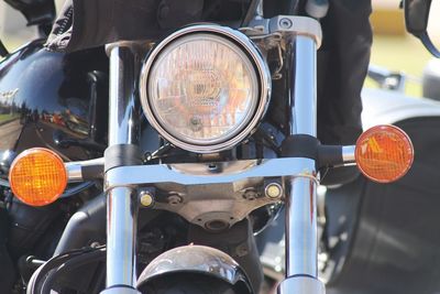 Close-up of motorbike headlight