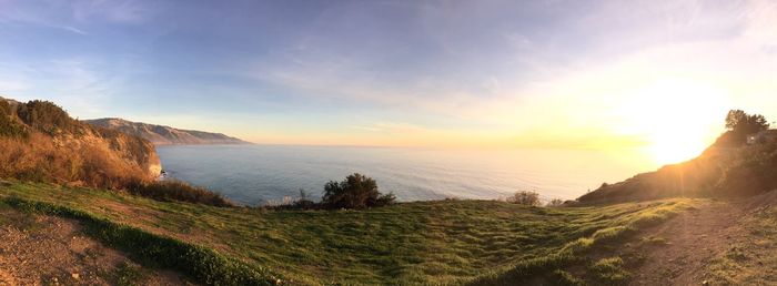 Scenic view of sea against sky during sunset