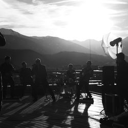 People at town square against sky