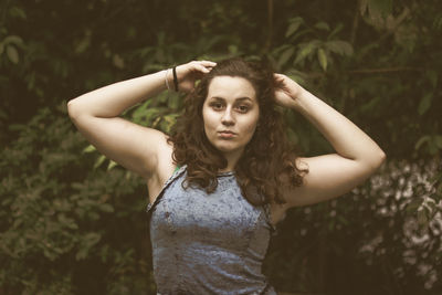 Portrait of beautiful teenage girl standing outdoors