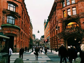 People walking on city street