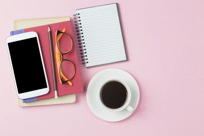 Directly above shot of coffee cup on table