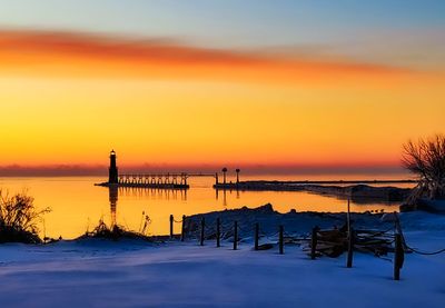 Scenic view of sea against sky during sunset