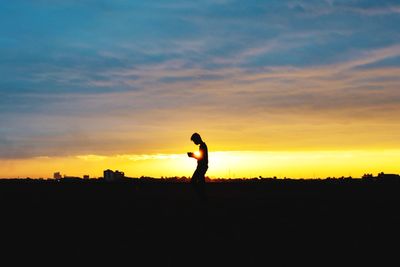 Silhouette of trees at sunset