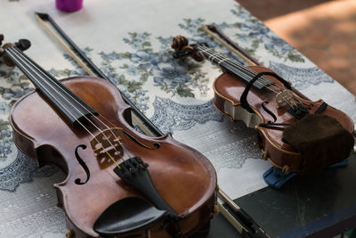 High angle view of violins on table