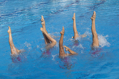 Women swimming in pool