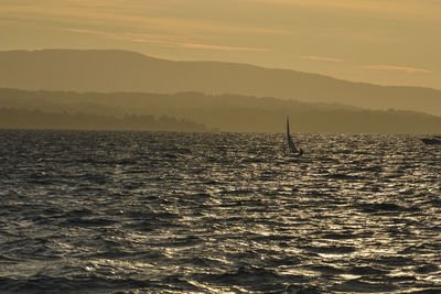 Scenic view of sea against sky during sunset