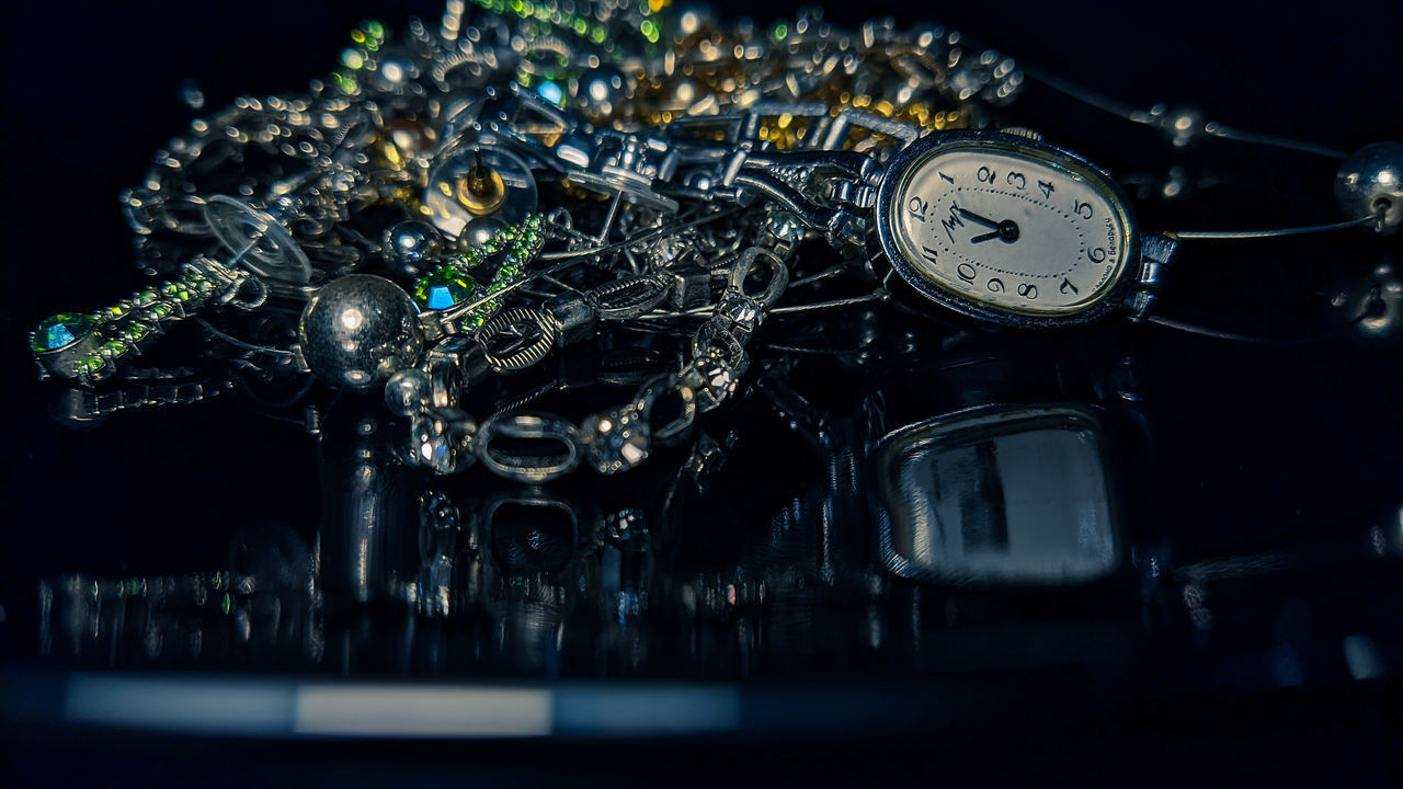 CLOSE-UP OF CLOCK AT NIGHT