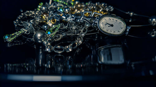 Close-up of clock on table