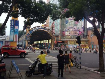 People on street in city