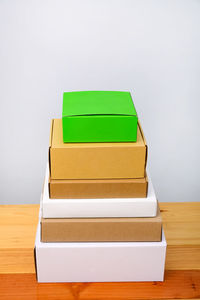 Close-up of books on table against white background