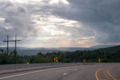 View of bridge against cloudy sky