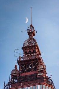 Moonrise by the tower