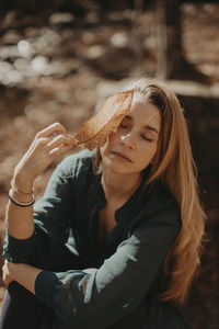 Portrait of a young woman wearing hat