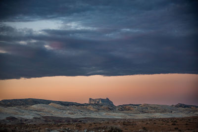 Rock formation with approaching storm