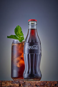 Close-up of drink in glass jar on table