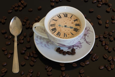 High angle view of coffee cup on table