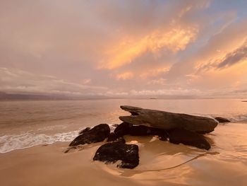 Scenic view of sea against sky during sunset