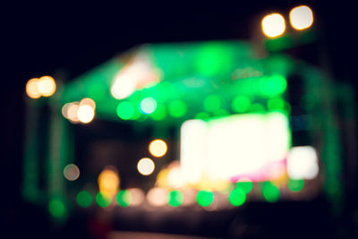 Defocused image of illuminated lights at night