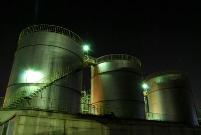 Low angle view of illuminated building at night