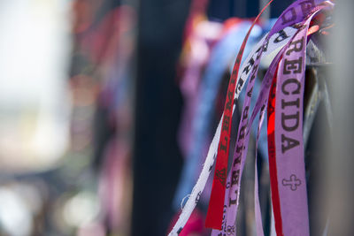 Close-up of clothes hanging on display at store