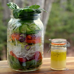 Close-up of drink in glass jar on table