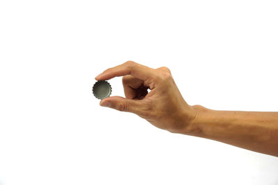 Close-up of person hand against white background