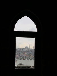 Buildings seen through window