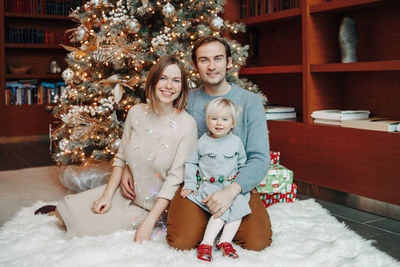 Group of people in christmas tree